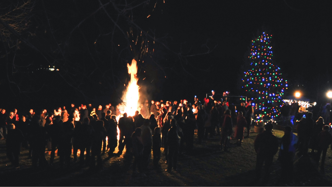 Bonfire and Christmas tree at night