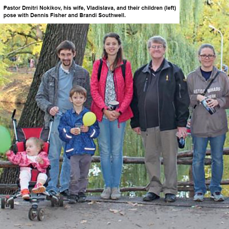 Dmitri, his family, Dennis Fisher and Brandi Southwell.