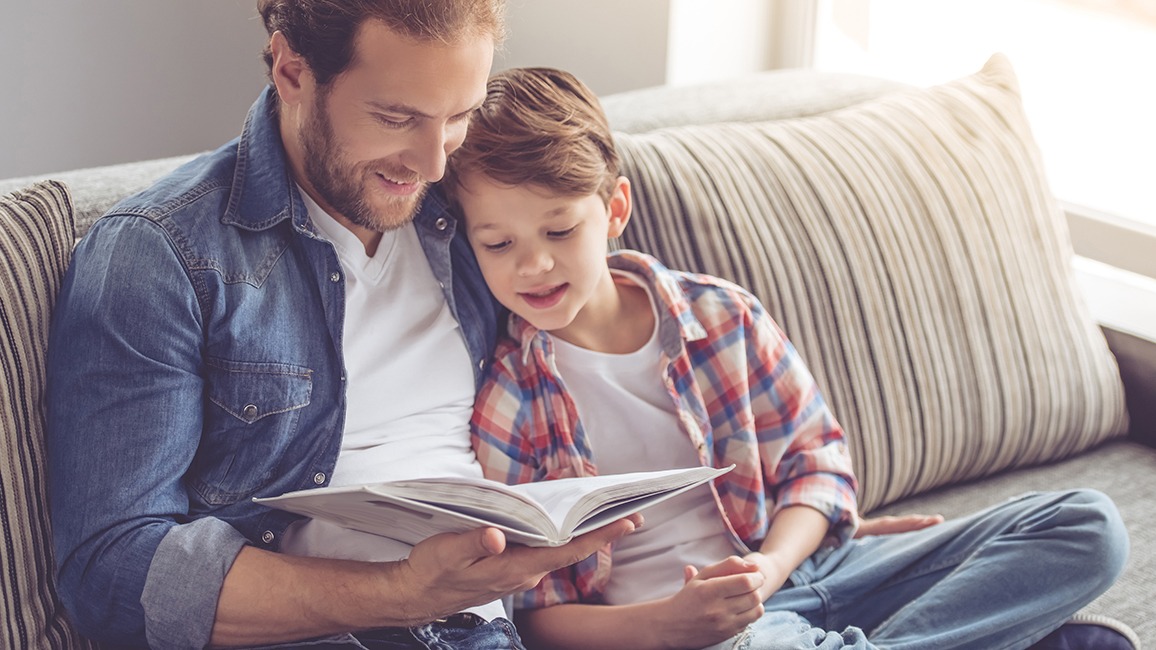 Dad and son reading