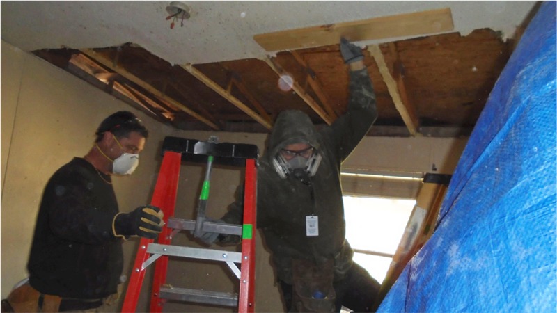 Mission trip fixing ceiling