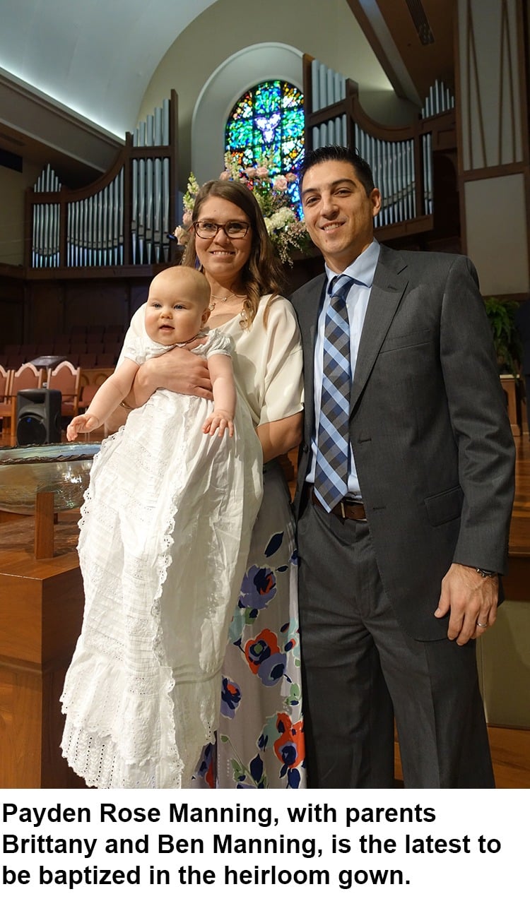Payden Rose Manning, with parents Brittany and Ben Manning.