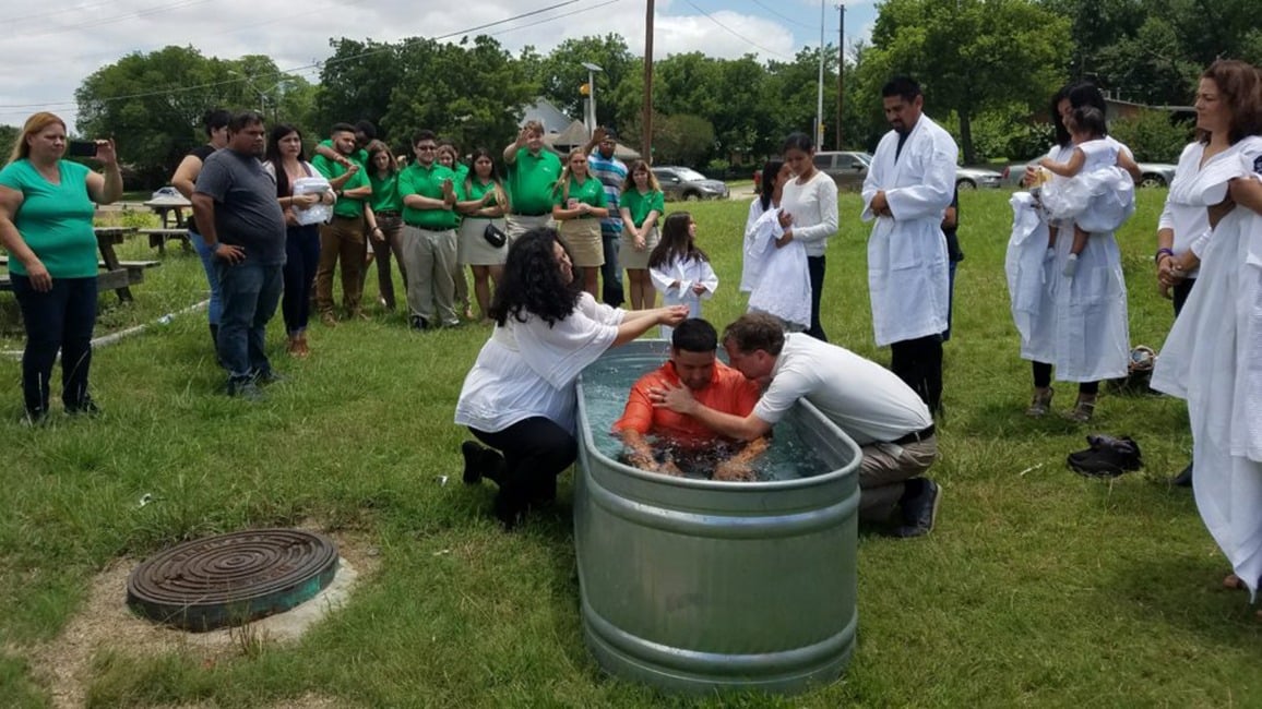 Ross preforms baptism