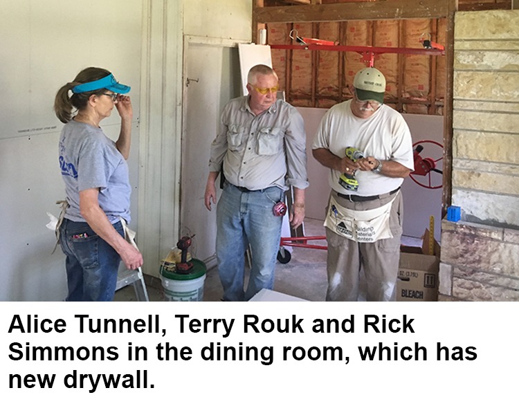 Finishing the drywall in the living room